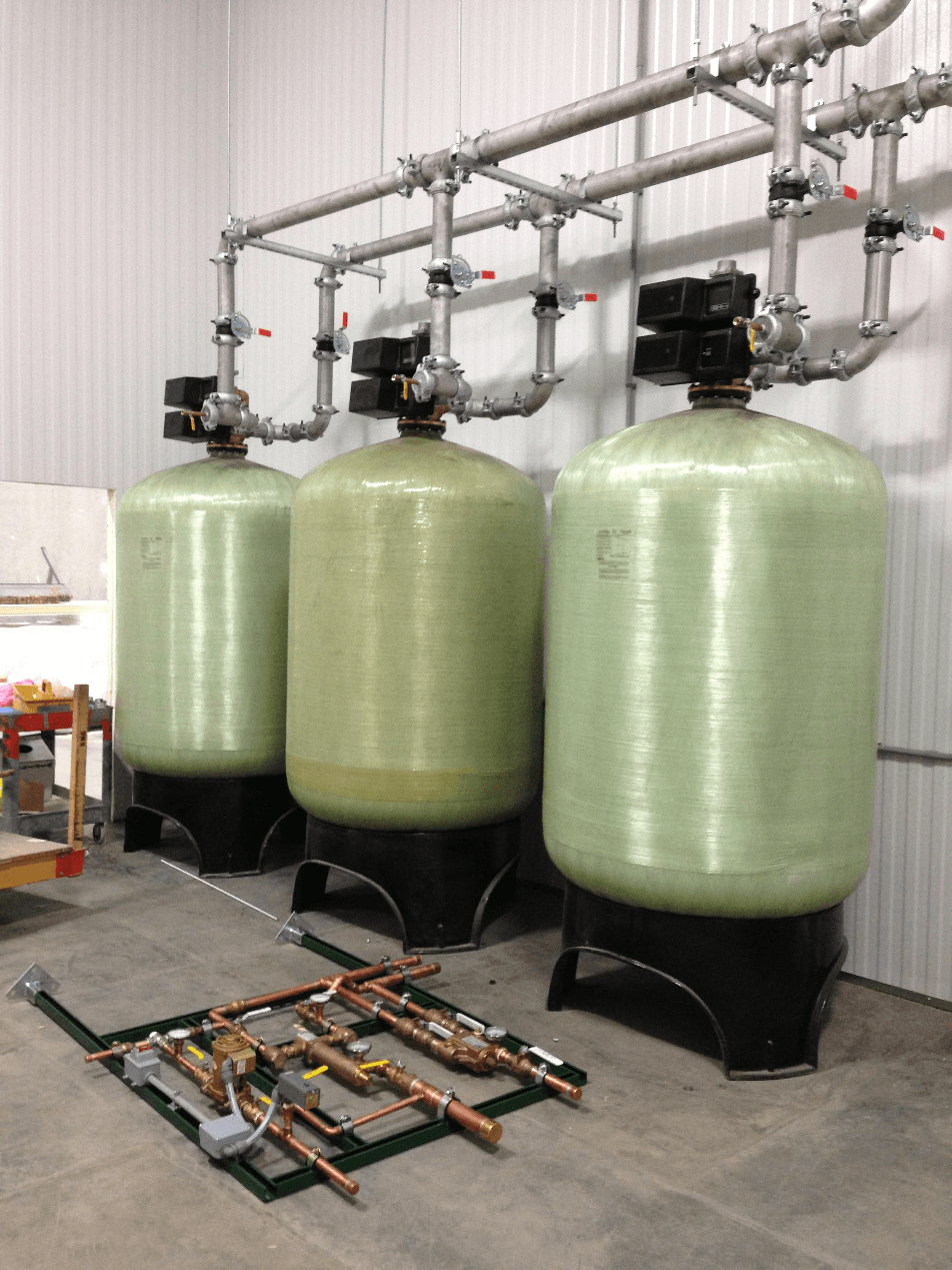 two commercial water softeners 